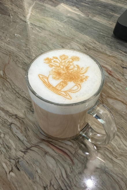 Latte with ripple printer logo at Pour and decor cafe St Petersburg FL