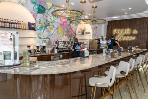 Coffee bar with locally painted mural at Pour and Decor cafe and retail store St Petersburg FL