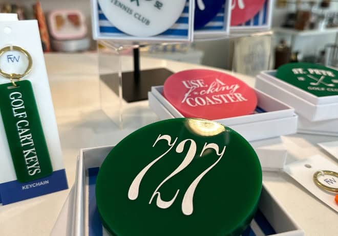 Local coasters and key chain tags at Pour & Decor home décor shop St Petersburg FL